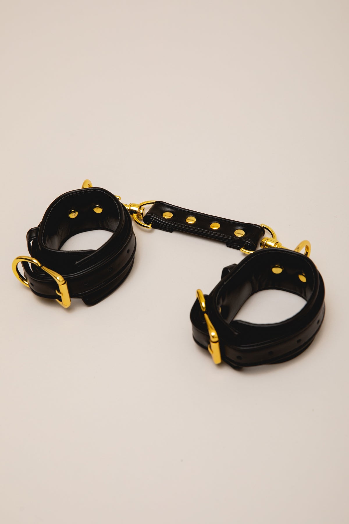 EROS LEATHER HANDCUFFS.