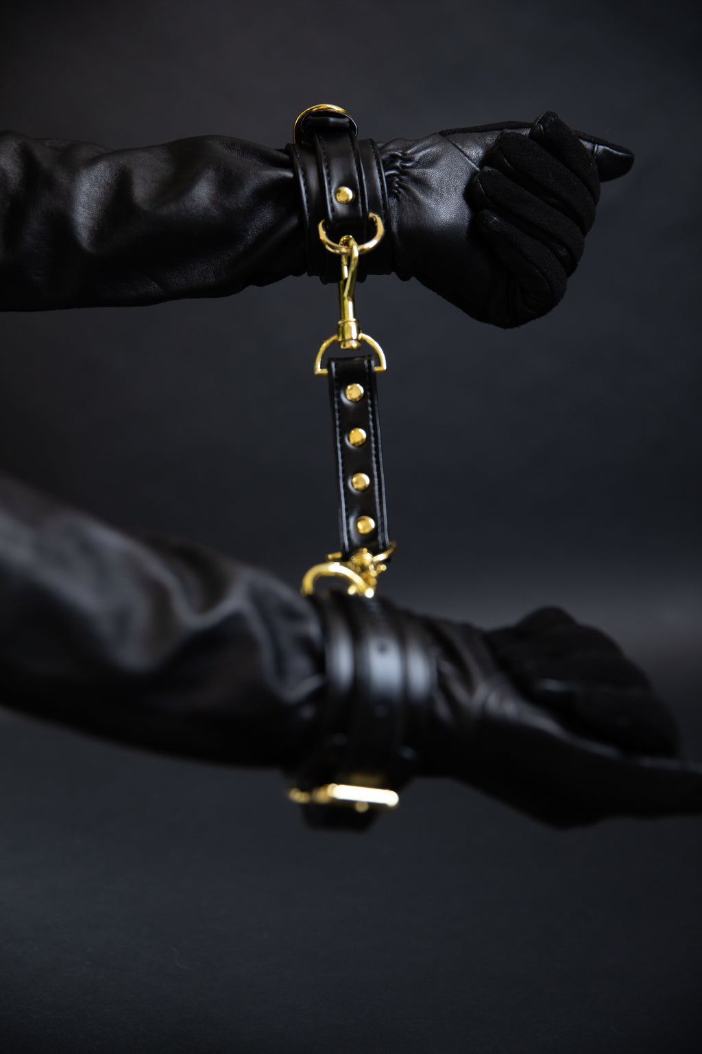 EROS LEATHER HANDCUFFS.